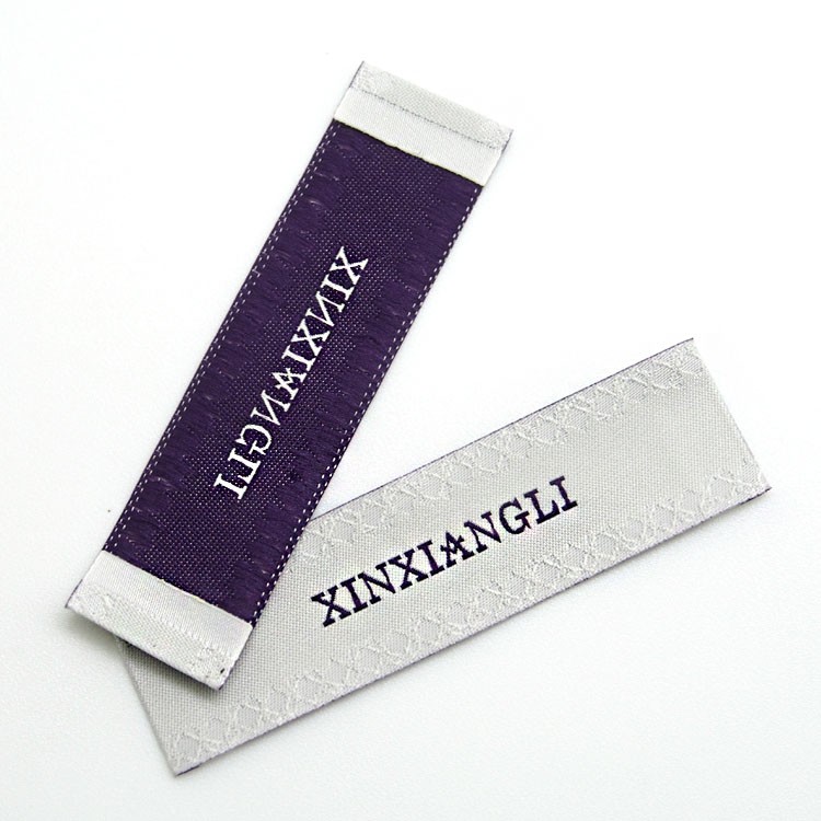 東莞廠家定做織嘜商標(biāo)新款壓紋織標(biāo)服裝輔料批發(fā)定制可來圖設(shè)計